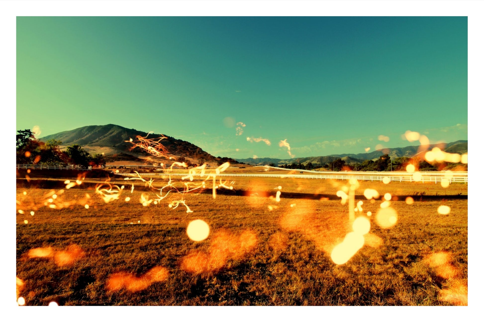 Fine art photography of green rolling hills in San Luis Obispo, California; kinetic digital light streaks across a pastoral landscape; cinematic Central Coast art.