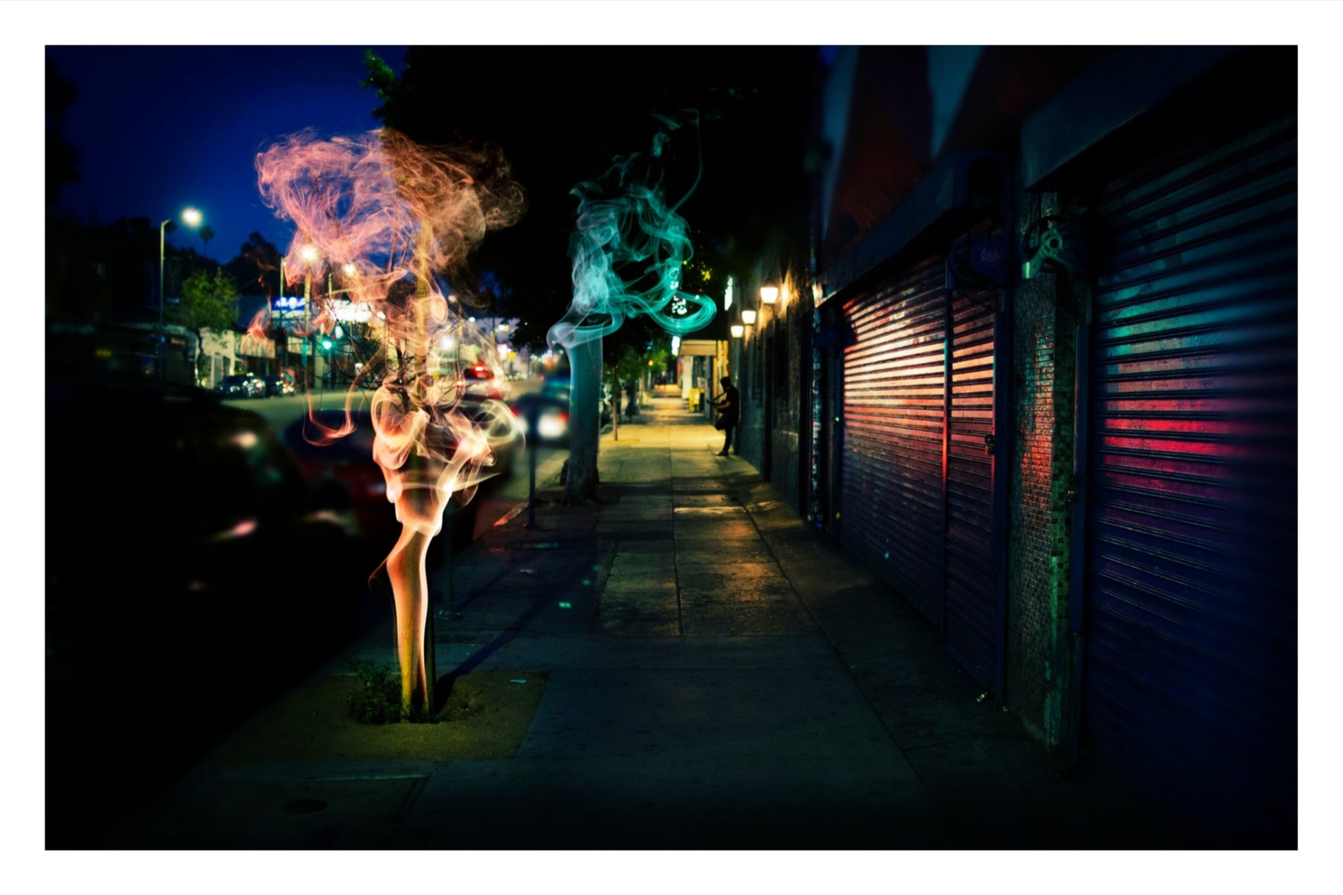 Fine art photography of vibrant smoke plumes on an Echo Park street at night, Los Angeles noir aesthetic, deep shadows and kinetic light, cinematic urban reconstruction.